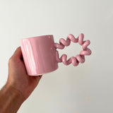 Studio palu roze koffiemok in hand