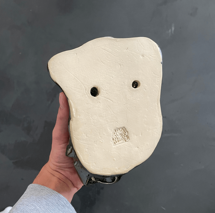 Wandvaas keramiek achterkant