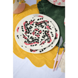 Po de barro bord bloemen met bestek