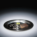 Theezakje op metalen serveerschaal