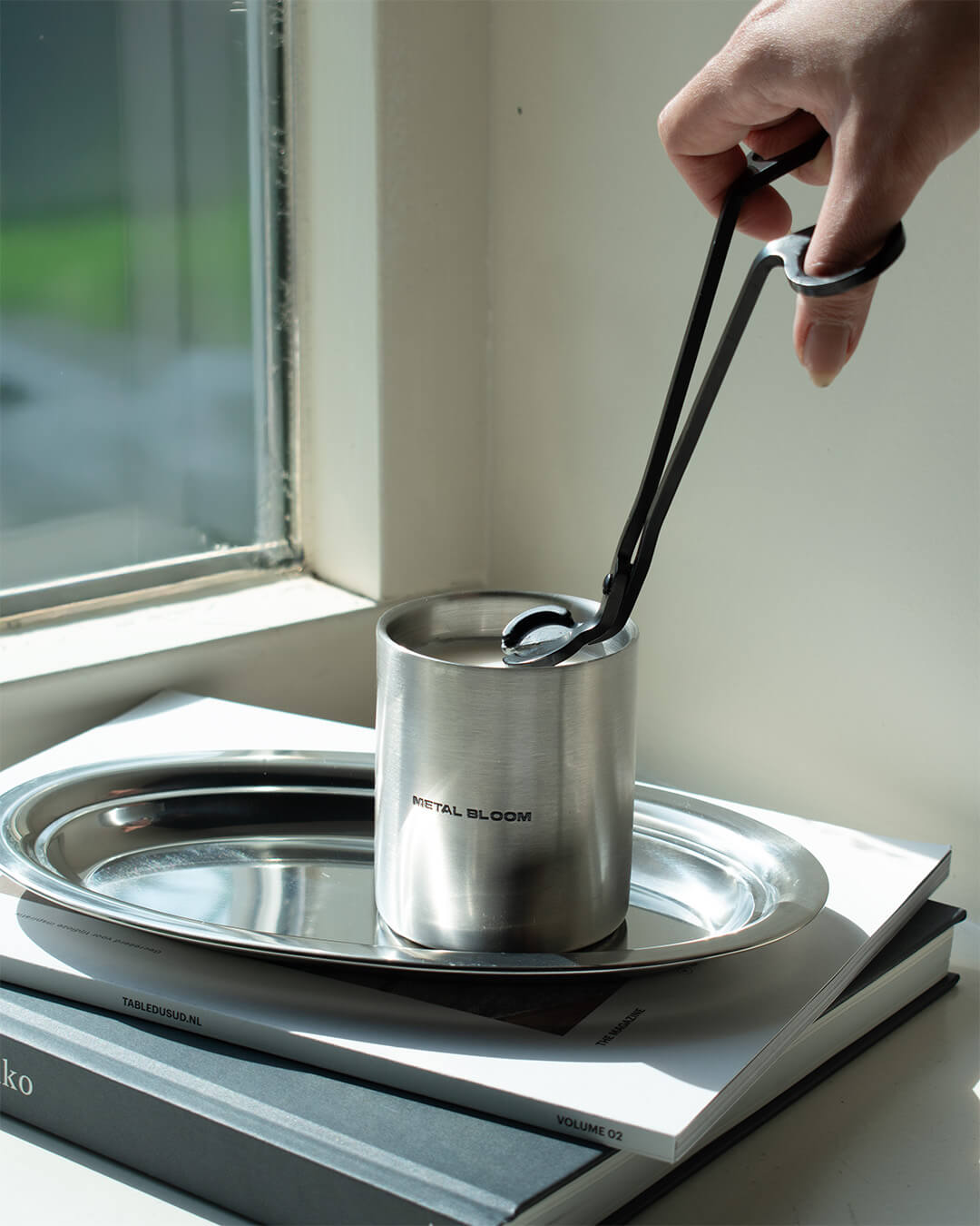 Metal bloom kaars aansteken